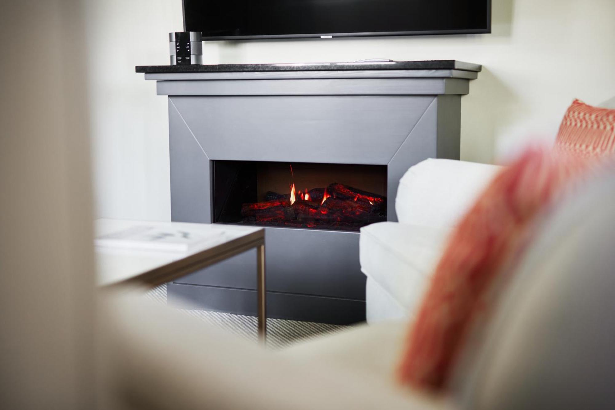 Strandhotel Цингст Екстериор снимка A modern electric fireplace